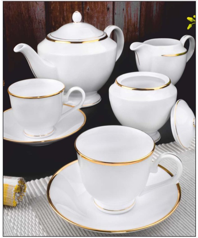 Porcelain tea set by S. R TRADER